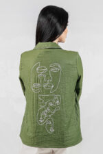 woman wearing cotton shirt with embroidery