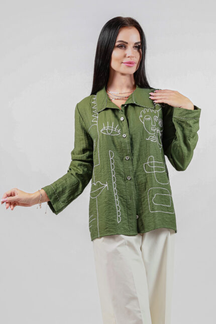 woman wearing cotton blend shirt with embroidery