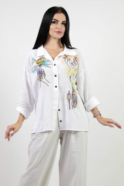 woman wearing linen shirt with embroidery