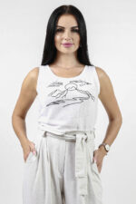 woman wearing linen top white color