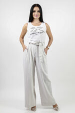 woman wearing linen trousers and linen top