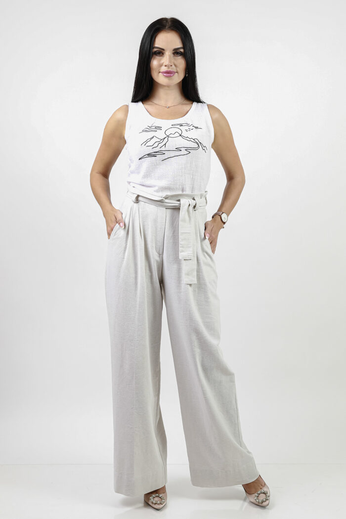 Woman Wearing Linen Trousers And Linen Top
