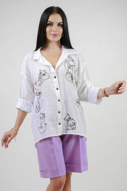 woman wearing linen shirt with embroidery