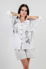 woman wearing linen shirt with embroidery