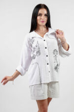 woman wearing linen shirt off white colour with embroidery
