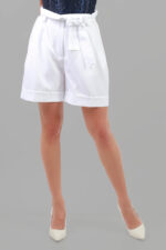 model wearing high-rise shorts with pockets white color