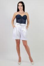 woman wearing high-rise shorts with the belt white color
