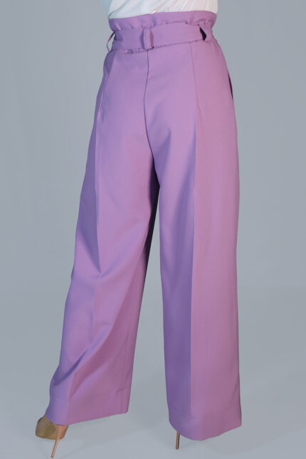 woman wearing high-rise trousers view from the back