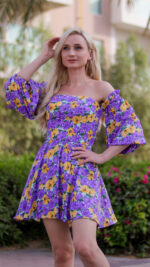 woman wearing floral print mini dress
