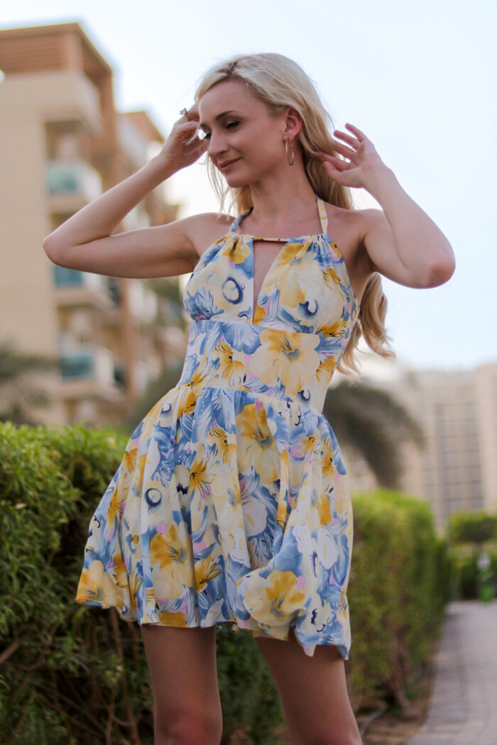 Woman Wearing Floral Mini Dress