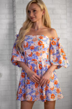 woman wearing summer mini dress floral print