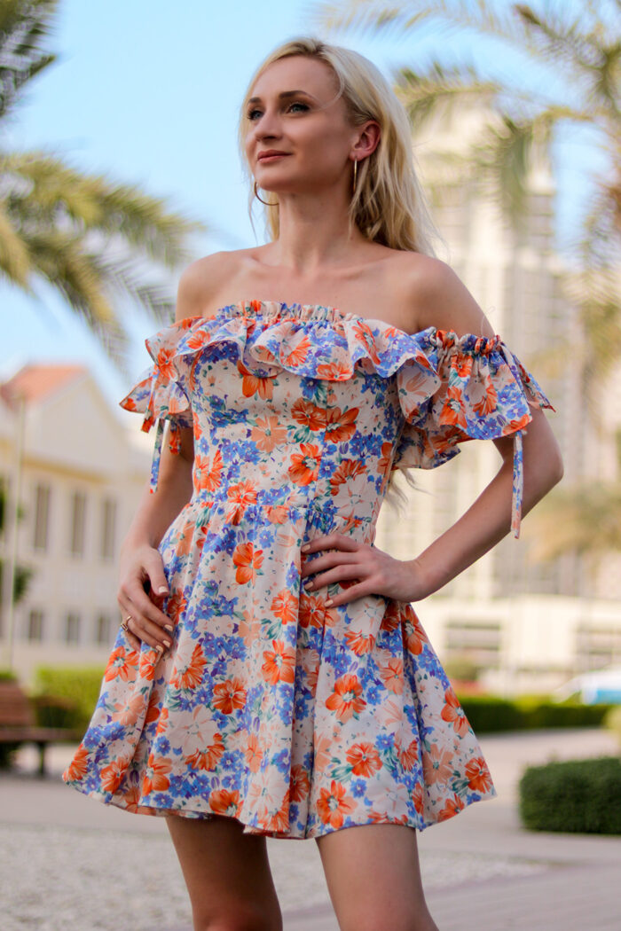 Woman Wearing Mini Dress With Ruffles
