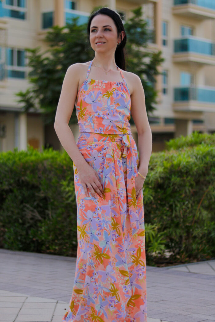 Woman Wearing Cropped Top &Amp; Maxi Wrap Skirt Floral Print