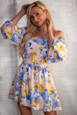 woman wearing summer mini dress floral print