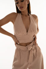 woman wearing pink cropped top