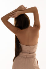 woman wearing pink cropped top