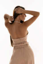 woman wearing pink cropped top