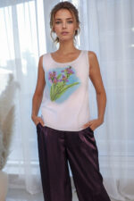 woman wearing cotton top with embroidery