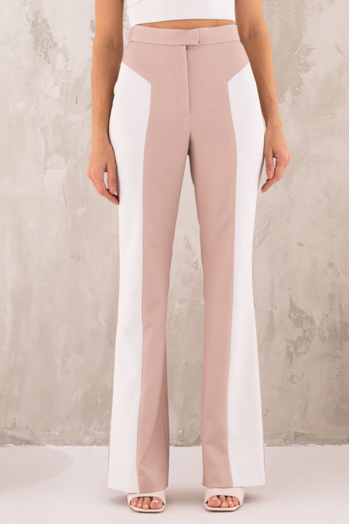 Woman Wearing High-Waisted Trousers Beige And White Color
