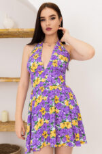 woman wearing floral mini dress
