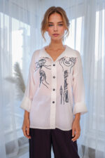woman wearing cotton shirt with embroidery