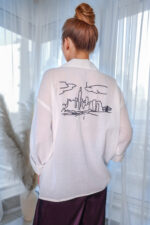 woman wearing cotton shirt with embroidery