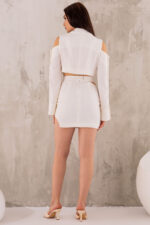 woman wearing off white mini skirt