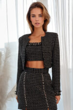 woman wearing tweed cropped jacket