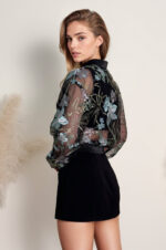 woman wearing bomber jacket made of tulle