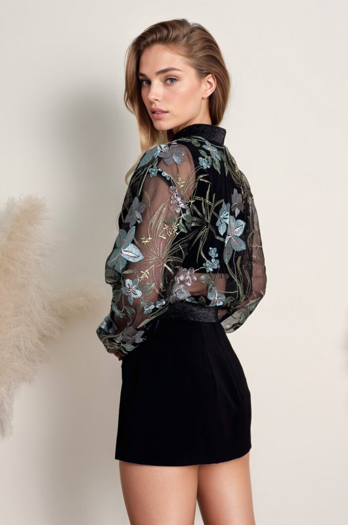Woman Wearing Bomber Jacket Made Of Tulle