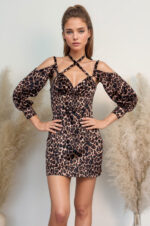 woman wearing leopard print party mini dress